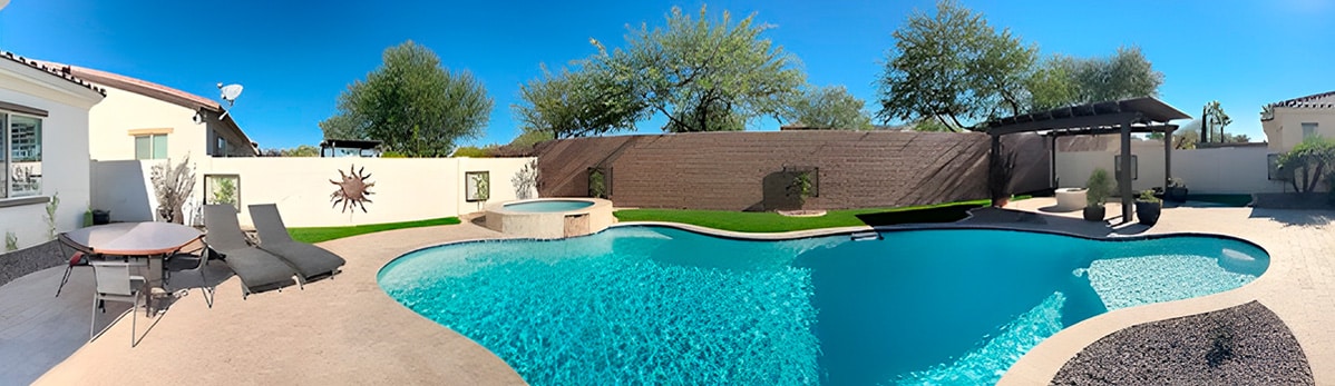 High-End Outdoor Living Space with Pool and Lounge Area