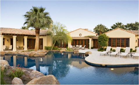 Luxury Pool Design with Lounge Area and Desert Landscaping