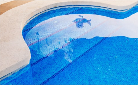 Custom Pool with Blue Mosaic Tiles and Fish Design