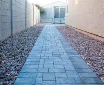Custom paver walkway installation in a residential landscape in Gilbert